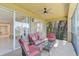 Screened balcony with seating and water view at 2251 Jessie Harbor Dr # 2101, Osprey, FL 34229