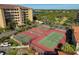 Aerial view of tennis courts near condo building at 2251 Jessie Harbor Dr # 2101, Osprey, FL 34229