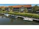 Boats docked near building; waterfront access available at 2251 Jessie Harbor Dr # 2101, Osprey, FL 34229