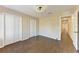 Bright bedroom with double door closet and wood-look tile floors at 227 Cape Harbour Loop # 103, Bradenton, FL 34212