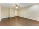 Spacious common area with hardwood floors and an arched doorway at 227 Cape Harbour Loop # 103, Bradenton, FL 34212