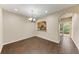 Elegant dining room features hardwood floors and a view of the kitchen at 227 Cape Harbour Loop # 103, Bradenton, FL 34212