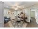 Bright home office features wood floors, ceiling fan, and built-in shelving at 227 Cape Harbour Loop # 103, Bradenton, FL 34212
