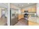 Modern kitchen with stainless steel appliances and granite countertops at 227 Cape Harbour Loop # 103, Bradenton, FL 34212