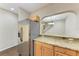 Modern kitchen with stainless steel appliances and granite countertops at 227 Cape Harbour Loop # 103, Bradenton, FL 34212