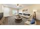 Bright living room with hardwood floors, comfortable seating, and stylish decor at 227 Cape Harbour Loop # 103, Bradenton, FL 34212