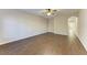 Spacious living room with dark brown tile flooring and a ceiling fan at 227 Cape Harbour Loop # 103, Bradenton, FL 34212