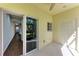 Covered patio with sliding glass doors and access to backyard at 227 Cape Harbour Loop # 103, Bradenton, FL 34212
