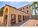 Exterior view of Sarasota Opera House; featuring arched entryway and wrought iron gates at 2425 Golf Course Dr # 704, Sarasota, FL 34234