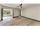 Spacious bedroom with modern ceiling fan, stylish wood flooring and natural light at 2435 Sumatran Way # 35, Clearwater, FL 33763