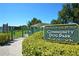 Community dog park with fenced area and seating at 2435 Sumatran Way # 35, Clearwater, FL 33763