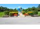 Landscaped entrance to community featuring a large globe at 2435 Sumatran Way # 35, Clearwater, FL 33763