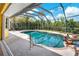 Enclosed pool and spa area with ample space for relaxation at 24508 Saragossa Ln, Punta Gorda, FL 33955