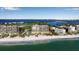 Aerial view of beachfront property and community at 415 L Ambiance Dr # A801, Longboat Key, FL 34228