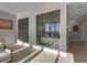 Luxury bathroom with glass-enclosed tub and shower, ocean view at 415 L Ambiance Dr # A801, Longboat Key, FL 34228