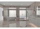 Luxurious bathroom with marble finishes, soaking tub, and large walk-in shower at 415 L Ambiance Dr # A801, Longboat Key, FL 34228