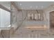 Modern bathroom with marble flooring and a floating vanity at 415 L Ambiance Dr # A801, Longboat Key, FL 34228