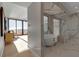 Spa-like bathroom with a freestanding tub and walk-in shower at 415 L Ambiance Dr # A801, Longboat Key, FL 34228