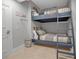 Charming bedroom with built-in bunk beds and updated decor at 415 L Ambiance Dr # A801, Longboat Key, FL 34228