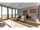 Main bedroom with ocean views and seating area at 415 L Ambiance Dr # A801, Longboat Key, FL 34228