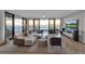 Luxury living room with ocean views and large screen TV at 415 L Ambiance Dr # A801, Longboat Key, FL 34228