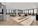 Spacious living room with ocean views and marble floors at 415 L Ambiance Dr # A801, Longboat Key, FL 34228