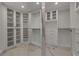 Spacious walk-in closet with ample shelving and hanging space at 415 L Ambiance Dr # A801, Longboat Key, FL 34228