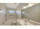 Clean bathroom featuring a tub, toilet, sink, and vanity at 42 Marker Rd, Rotonda West, FL 33947