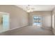 Bright bedroom with pool view and carpet floors at 42 Marker Rd, Rotonda West, FL 33947