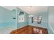 Dining room with hardwood floors and chandelier at 42 Marker Rd, Rotonda West, FL 33947