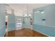 Spacious dining room with wood floors, view at 42 Marker Rd, Rotonda West, FL 33947