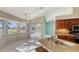 Kitchen with granite counters and pool view at 42 Marker Rd, Rotonda West, FL 33947