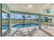 Inviting screened pool with a view of the golf course at 42 Marker Rd, Rotonda West, FL 33947