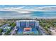 Coastal condominium highlighted by an arrow, showcasing its proximity to the beach and amenities at 420 Beach Rd # 203, Sarasota, FL 34242