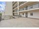 Private balcony with railing overlooking the complex at 420 Beach Rd # 203, Sarasota, FL 34242
