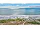 Expansive white sand beach with calm, clear waters at 420 Beach Rd # 203, Sarasota, FL 34242