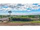 Private beach access with boardwalk and seating area at 420 Beach Rd # 203, Sarasota, FL 34242