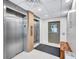 Building elevator with modern design and accessibility features at 420 Beach Rd # 203, Sarasota, FL 34242