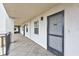Outdoor hallway leading to individual units at 420 Beach Rd # 203, Sarasota, FL 34242
