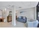 Building lobby with seating area, wood cabinet, and large window at 420 Beach Rd # 203, Sarasota, FL 34242