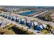 Wide shot of neighborhood with houses, roads, and a lake at 4326 Tamarind Pl, Bradenton, FL 34203