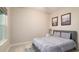 Guest bedroom with a queen-size bed and calming decor at 4326 Tamarind Pl, Bradenton, FL 34203