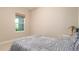 Well-lit bedroom featuring a comfortable double bed and window seat at 4326 Tamarind Pl, Bradenton, FL 34203