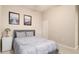 Bright bedroom with a double bed and neutral decor at 4326 Tamarind Pl, Bradenton, FL 34203