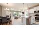 Modern kitchen with stainless steel appliances and white cabinetry at 4326 Tamarind Pl, Bradenton, FL 34203