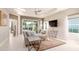 Spacious living room with sliding glass doors leading to the patio at 4326 Tamarind Pl, Bradenton, FL 34203