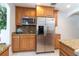 Stainless steel refrigerator and microwave in kitchen at 452 Canal Rd, Sarasota, FL 34242