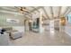 Open floor plan showcasing the living room's seamless flow into the kitchen with lots of light at 4626 Gleason Ave, Sarasota, FL 34242