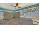 Inviting covered patio with brick flooring, open design, and partial privacy screen at 4626 Gleason Ave, Sarasota, FL 34242