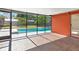 Relaxing screened pool enclosure with tiled floor at 4914 Silk Oak Dr, Sarasota, FL 34232